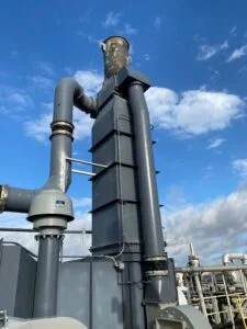 Adwest Direct Fired Thermal Oxidizer (DFTO) with robust piping system, used for VOC destruction and air pollution control in industrial plants.